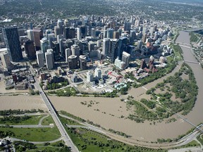 A flooded downtown Calgary is seen from a aerial view of the city Saturday, June 22, 2013.