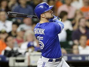 Randal Grichuk of the Toronto Blue Jays hits a two-run home run in the eighth inning against the Houston Astros at Minute Maid Park on June 25, 2018. (Bob Levey/Getty Images)