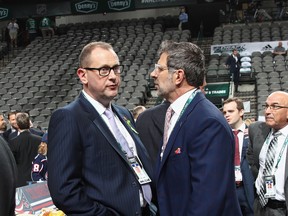 DALLAS, TX - JUNE 22: Brad Treliving of the Calgary Flames and Marc Bergevin of the Montreal Candiens chat prior to the first round of the 2018 NHL Draft at American Airlines Center on June 22, 2018 in Dallas, Texas.  (Photo by Bruce Bennett/Getty Images)