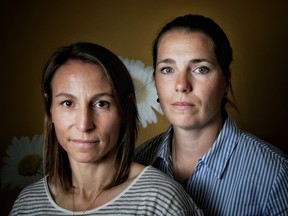 Amélie-Frédérique Gagnon, left and Geneviève Simard, two victims of Bertrand Charest, pose for a portrait after a press conference at the Sheldon Kennedy Child Advocacy Centre Calgary, on Friday June 8, 2018. Leah Hennel/Postmedia