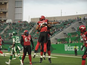 Calgary Stampeders wide receiver Nick Truesdell celebrates a touchdown after hauling in a touchdown pass during first half pre-season CFL action at Mosaic Stadium in Regina on Friday, June 8, 2018. THE CANADIAN PRESS/Mark Taylor ORG XMIT: MT110