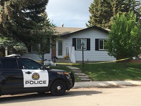 The scene from outside a residence in the 0-100 block of Margate Place N.E. on June 9, where Calgary police say they found a man in medical distress.