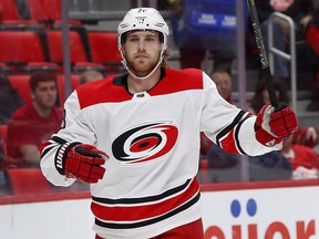 The Calgary Flames have signed forward Elias Lindholm to a six-year pact.