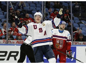 FILE - In this Jan. 5, 2018, file photo, United States forward Brady Tkachuk celebrates a goal during the second period in the bronze medal game of the world junior hockey championships against the Czech Republic in Buffalo, N.Y.  The action at the NHL draft is expected to start at the third pick if Buffalo takes Swedish defenseman Rasmus Dahlin first and Carolina goes with Russian forward Andrei Svechnikov as many expect. Brady Tkachuk and Quinn Hughes are among the Americans expected to go in the top 10.