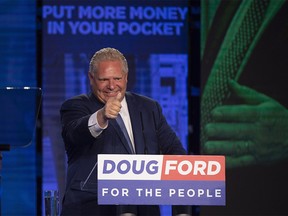 Ontario PC leader Doug Ford reacts after winning the Ontario Provincial election to become the new premier in Toronto, on Thursday, June 7, 2018. THE CANADIAN PRESS/Nathan Denette ORG XMIT: NSD801