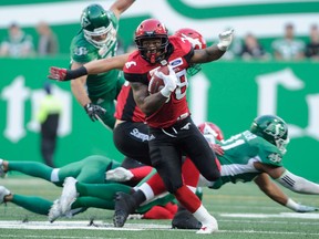 Calgary Stampeders running back Terry Williams runs back a punt for a touchdown against the Saskatchewan Roughriders during pre-season CFL action at Mosaic Stadium in Regina on June 8, 2018