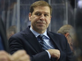 Doug Weight of the New York Islanders handles his first game as head coach against the Dallas Stars at the Barclays Center on Jan. 19, 2017