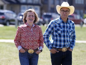 Premier Rachel Notley, and Minister of Finance Joe Ceci, arrive at Scotsman's Hill in Calgary  on Wednesday July 4, 2018. Leah Hennel/Postmedia