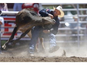 Cody Cassidy of Donalda, Alberta during the Calgary Stampede steer wrestling championships at the the Calgary Stampede in Calgary on Saturday July 7, 2018. Leah Hennel/Postmedia
