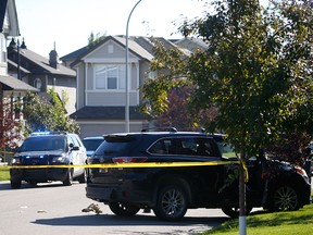 Calgary police investigators at the scene of a police shooting of a vehicle theft suspect in the 0-100 block of Autumn View S.E.