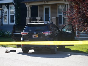 Calgary police investigators at the scene of a police shooting of a vehicle theft suspect in the 0-100 block of Autumn View S.E.