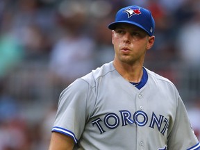 Toronto Blue Jays starting pitcher Sam Gaviglio is pulled from the baseball game against the Atlanta Braves in the second inning Wednesday, July 11, 2018, in Atlanta. (AP Photo/Todd Kirkland)