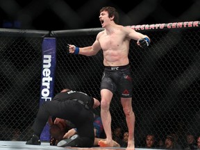 Olivier Aubin-Mercier celebrates his 1st round win over Evan Dunham during their lightweight bout at UFC 223 at Barclays Center on April 7, 2018 in New York City.