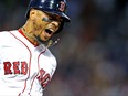 Mookie Betts of the Boston Red Sox celebrates after hitting a grand slam against the Toronto Blue Jays during the fourth inning at Fenway Park on July 12, 2018 in Boston. (Maddie Meyer/Getty Images)