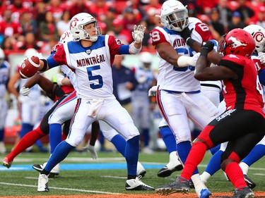Montreal Alouettes quarterback Willy Drew lines up a pass against the Calgary Stampeders during CFL action against the Montreal Alouettes at McMahon Stadium in Calgary on Saturday July 21, 2018.