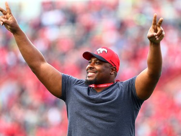 Former Calgary Stampeders Nik Lewis is applauded by fans during CFL action against the Montreal Alouettes at McMahon Stadium in Calgary on Saturday July 21, 2018. Nick Lewis retired as a Calgary Stampeder after the team honoured him with a one day contract and a video tribute to his long career with the team.