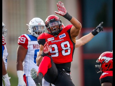 Calgary Stampeders James Vaughters celebrates after a sack on quarterback Matthew Shiltz of the Montreal Alouettesduring CFL football in Calgary on Saturday, July 21, 2018.