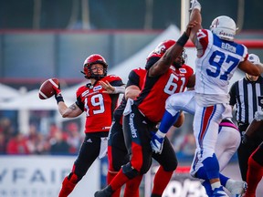 Calgary Stampeders quarterback Bo Levi Mitchell throws the ball against the Montreal Alouettes during CFL football in Calgary on Saturday, July 21, 2018.