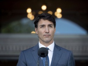 Prime Minister Justin Trudeau speaks during a press conference following a swearing in ceremony at Rideau Hall in Ottawa on Wednesday, July 18, 2018.