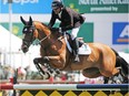 Canada's Eric Lamaze and Fine Lady 5 won the ATCO Queen Elizabeth II Cup at the Spruce Meadows North American show jumping event on Saturday July 7, 2018. Gavin Young/Postmedia