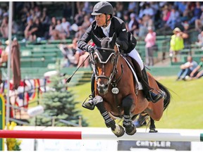 USA's Kent Farrington and Jasper won the Imperial Winning Round at the Spruce Meadows North American show jumping event on Saturday July 7, 2018.  Gavin Young/Postmedia
