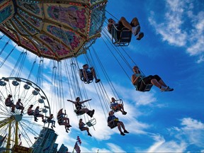 After the heat of the day evening was a great time to take enjoy the rides on the Calgary Stampede Midway, Monday July 9, 2018.  Gavin Young/Postmedia