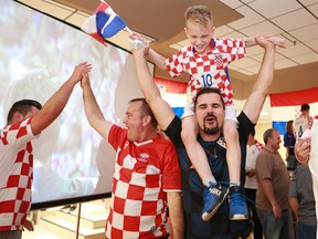 Croatian fans celebrate at Calgary's Croatian-Canadian Cultural Centre after Croatia defeated England in World Cup Soccer semi-final action 2-1 on Wednesday July 11, 2018. Gavin Young/Postmedia