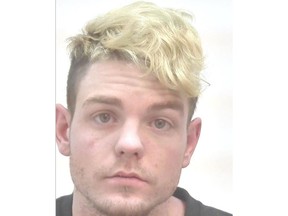 Christopher Andrew Munro, 27, of Calgary, is charged with two counts of kidnapping, two counts of uttering threats, and one count each of intimidation, robbery, motor vehicle theft and theft under $5,000. Courtesy / Calgary Police Service