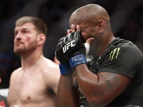 Daniel Cormier reacts after defeating Stipe Miocic in a heavyweight title bout at UFC 226, Saturday, July 7, 2018, in Las Vegas. (AP Photo/John Locher)