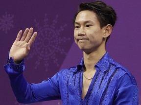 In this Feb. 16, 2018 file photo, figure skater Denis Ten of Kazakhstan, reacts as his score is posted following his performance in the men's short program at the 2018 Winter Olympics in Gangneung, South Korea. (AP Photo/David J. Phillip, File)