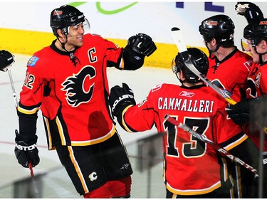 CALGARY, AB.: March 01, 2009  The Calgary Flames' Jarome Iginla, left, celebrates Craig Conroy's goal against the Tampa Bay Lightening during the second period of action at the Pengrowth Saddledome in Calgary March 1, 2009.  (Stuart Gradon / Calgary Herald)  (For story by Scott Cruickshank)  00018906M