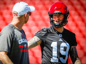 Calgary Stampeders head coach David Dickenson and quarterback Bo Levi Mitchell during practice on Monday, July 16, 2018.