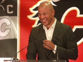 Former Calgary Flames Jarome Iginla speaks to a crowd of friends, family and fans at a retirement announcement in Calgary. Dean Pilling/Postmedia