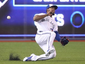 Teoscar Hernandez of the Toronto Blue Jays misplays a ball off the bat of Eduardo Escobar of the Minnesota Twins during MLB action at Rogers Centre on July 23, 2018 in Toronto. (Tom Szczerbowski/Getty Images)