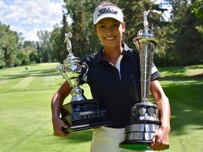 Kat Kennedy shows off the hardware after her win at the 2018 Sun Life Financial Alberta Ladies Amateur Championship.