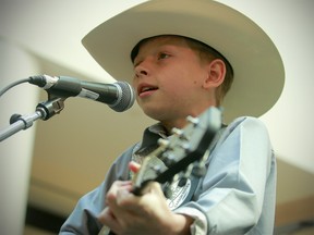 11-year-old Mason Ramsey,, aka Yodel Boy, performs at the Core shopping Centre on Friday, July 13, 2018. Dean Pilling/Postmedia
