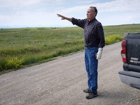 Former Blood Tribe Chief Harley Frank gestures from his truck on disputed land near his home near Spring Coulee , Alta., Thursday, July 5, 2018.THE CANADIAN PRESS/Jeff McIntosh ORG XMIT: JMC207