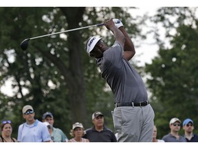 Vijay Singh watches his tee shot on the seventh hole during the final round of the Constellation Senior Players Championship golf tournament at Exmoor Country Club in Highland Park, Ill., Sunday, July 15, 2018.