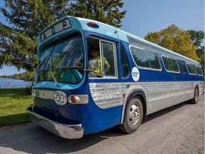 Manuel Cappel sits in the driver's seat of a vintage Calgary Transit bus located on the Toronto Islands. Cappel purchased the bus in 2016 and restored it to its former Calgary Transit livery. (Courtesy Sean Tamblyn)