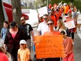 Nearly 50 people participated in Calgary's Victor Walk, recognizing survivors of child sex abuse which started at the Peace Bridge in Calgary on Saturday July 21, 2018.