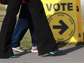 CALGARY, ; OCTOBER 19, 2015  --  It was a beautiful day in Calgary to get out and vote in the Federal election on Monday, October 19, 2015. The polling station at Stanley Jones school saw a steady stream of voters.  (Lorraine Hjalte/Calgary Herald) For news story by . Trax # 00069426A