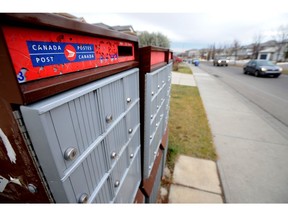 Beginning in January 2013, developers of new area's will be charged $200 per address for the cost of community mail and parcel boxes (CMPB's). This is a cost cutting measure by Canada Post in the wake of a $327-million loss last year. Photo taken in NW Calgary, Alta. on Nov. 6, 2012. Stuart Dryden/Calgary Sun/QMI Agency