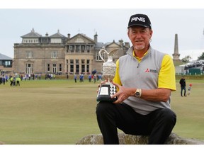 Miguel Angel Jimenez of Spain poses with the trophy after the final round of the Senior Open presented by Rolex played at The Old Course on July 29 in St. Andrews, Scotland.