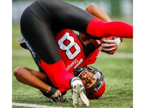 The Stampeders' Kamar Jorden makes a catch against the Winnipeg Blue Bombers during CFL football in Calgary on Saturday, August 25, 2018. Al Charest/Postmedia