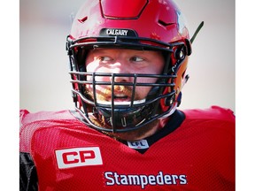Calgary Stampeders offensive lineman Spencer Wilson during warm-up before facing the Ottawa Redblacks in CFL football in Calgary on Thursday, June 29, 2017. Al Charest/Postmedia