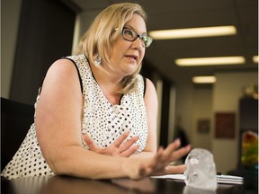 ASIRT executive director Susan Hughson, in her Edmonton office on Thursday, Aug. 16, 2018, said sometimes investigations of police officer-involved incidents take a long time because they can't afford to make mistakes.