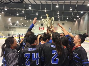 The Calgary United celebrate their national ball hockey title in Winnipeg.