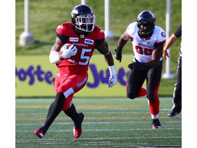 The Calgary Stampeders' Don Jackson runs the ball during CFL action against the Ottawa Redblacks at McMahon Stadium in Calgary on Thursday June 28, 2018. Gavin Young/Postmedia