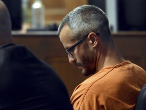 Christopher Watts looks down during his bond hearing at the Weld County Courthouse Thursday, Aug. 16, 2018, in Greeley, Colo.