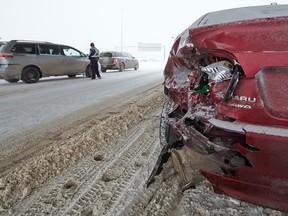 Multi-car collision on Deerfoot Trail on Feb. 5, 2017. Last December the province issued an order limiting cumulative auto rate hikes to five per cent, effective this November.